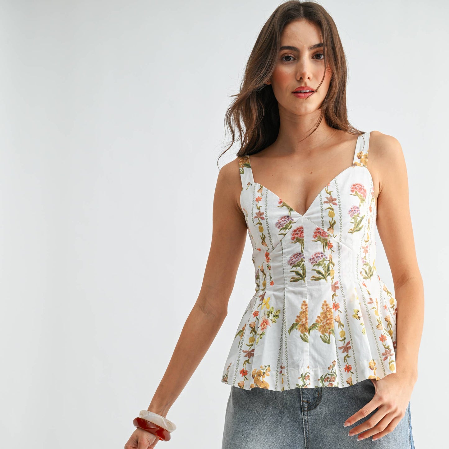 FLORAL PRINT PEPLUM TOP WITH ADJUSTABLE STRAPS