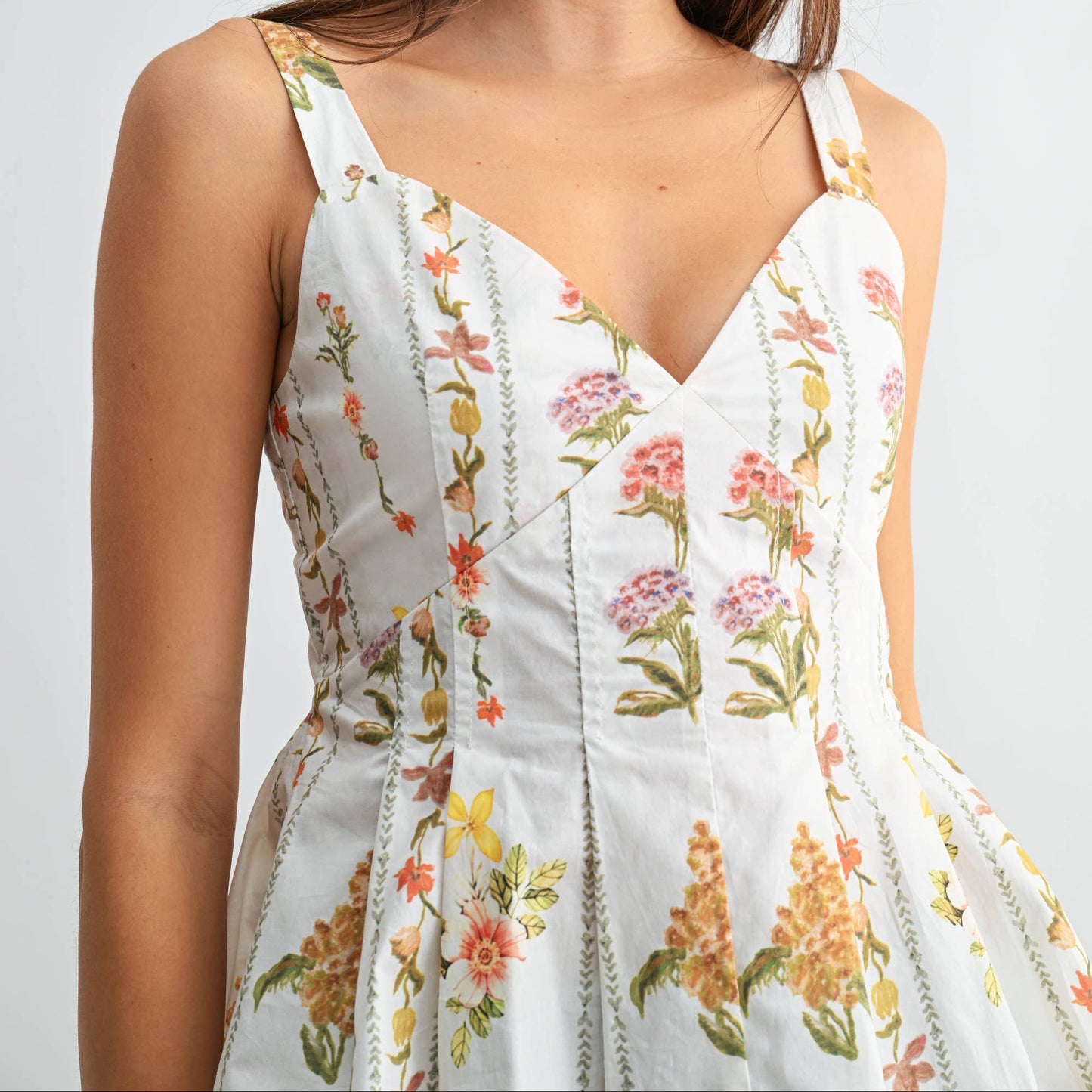 FLORAL PRINT PEPLUM TOP WITH ADJUSTABLE STRAPS